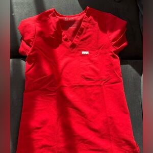 Winning red figs scrubs